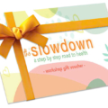 An image of a gift voucher with The Slowdown branding and a bow.
